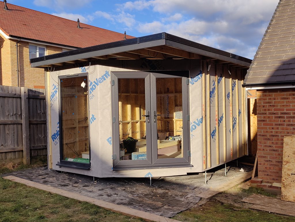 The Mallard Garden Room In St Albans - (Partially Completed Structure With Insulation And Glass Doors Installed, Showing Progress Towards Completion)