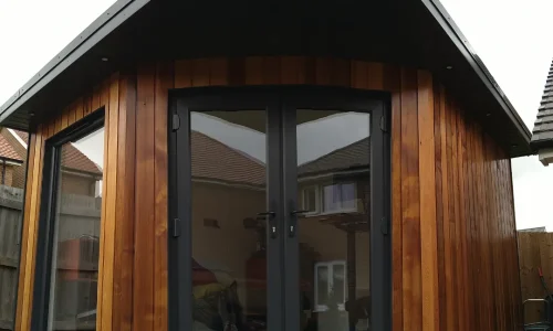 The Mallard Garden Room, St Albans - A Modern Garden Room With Large Glass Doors And Windows, Featuring A Sleek Wooden Exterior